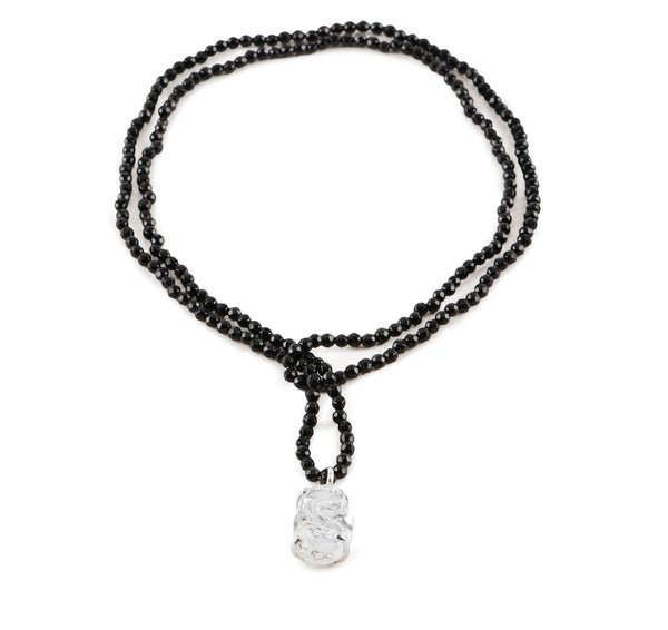 Opera Length beaded necklace with Glass Pendant.